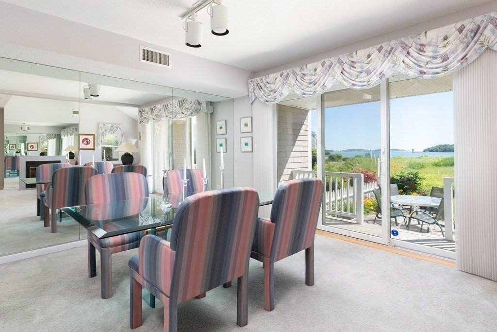 39 Harbourside Road, Unit 44 Quincy, MA 02171 - Photo 5 of 21 a view of a dining room with furniture window and outside view