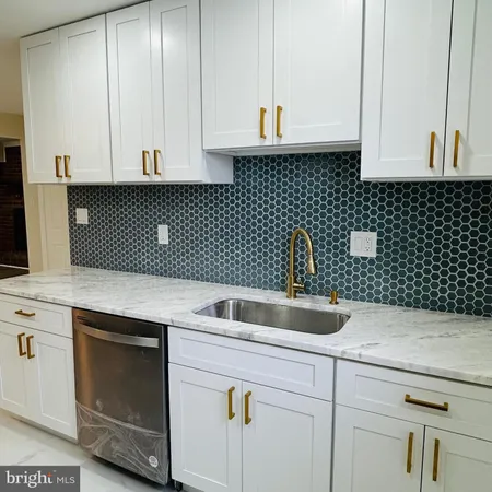 a view of a bathroom with wooden floor
