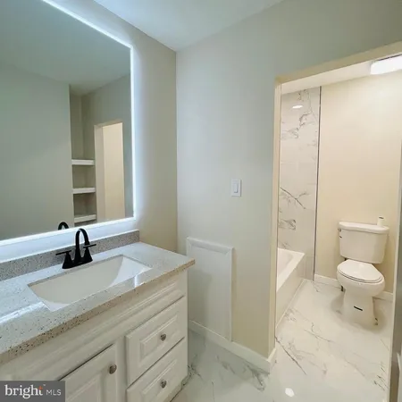 a front view of a stone house