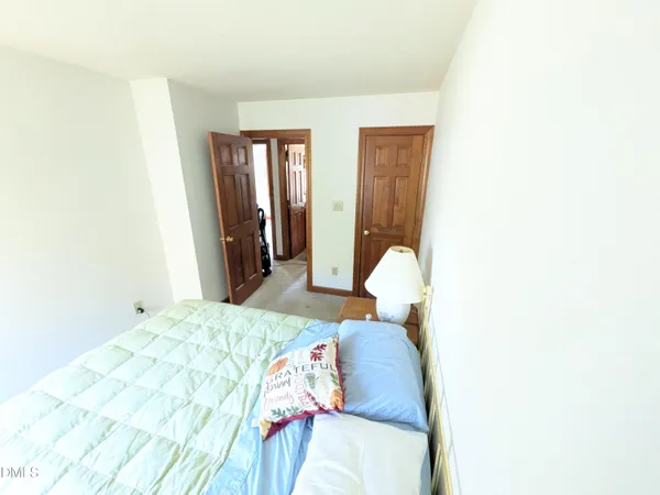 a view of a house with backyard and porch