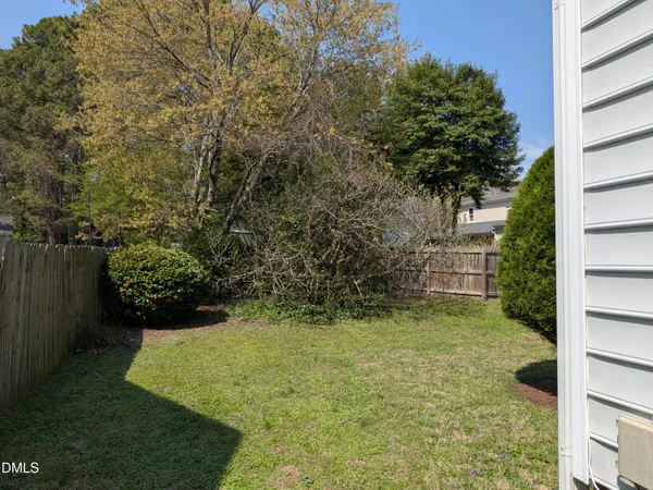 a front view of house with outdoor space