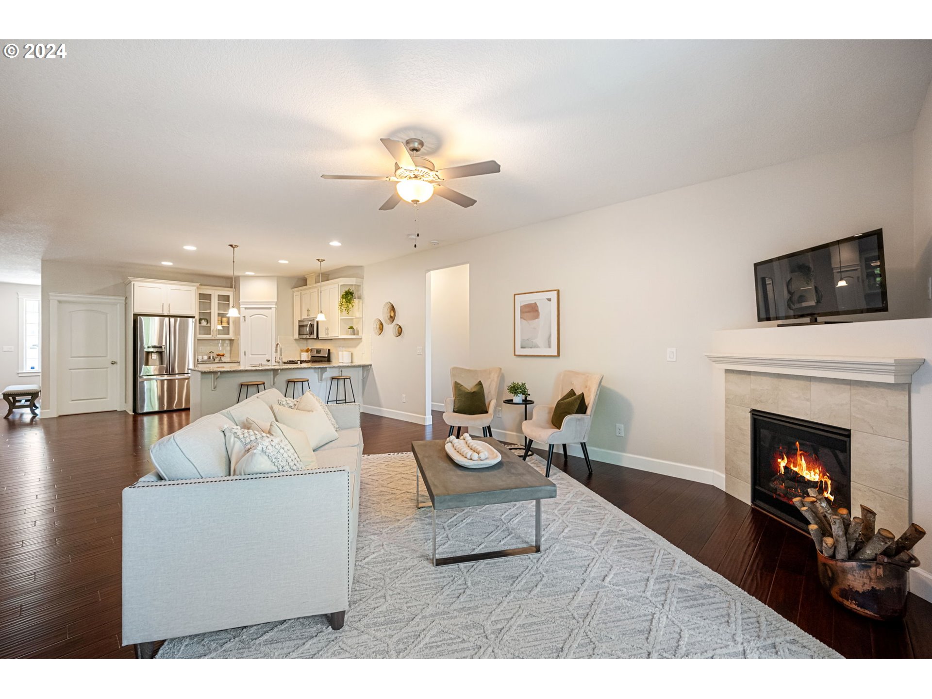 151 North 40th Avenue Ridgefield, WA 98642 - Photo 17 of 42 a living room with furniture and a fireplace