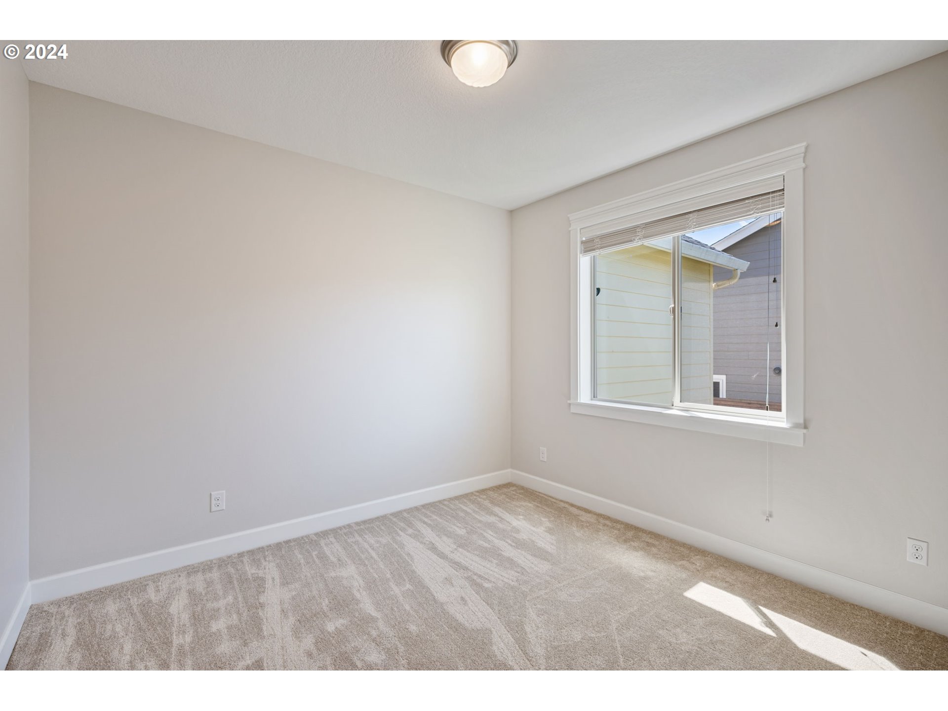 151 North 40th Avenue Ridgefield, WA 98642 - Photo 25 of 42 a view of an empty room with a window
