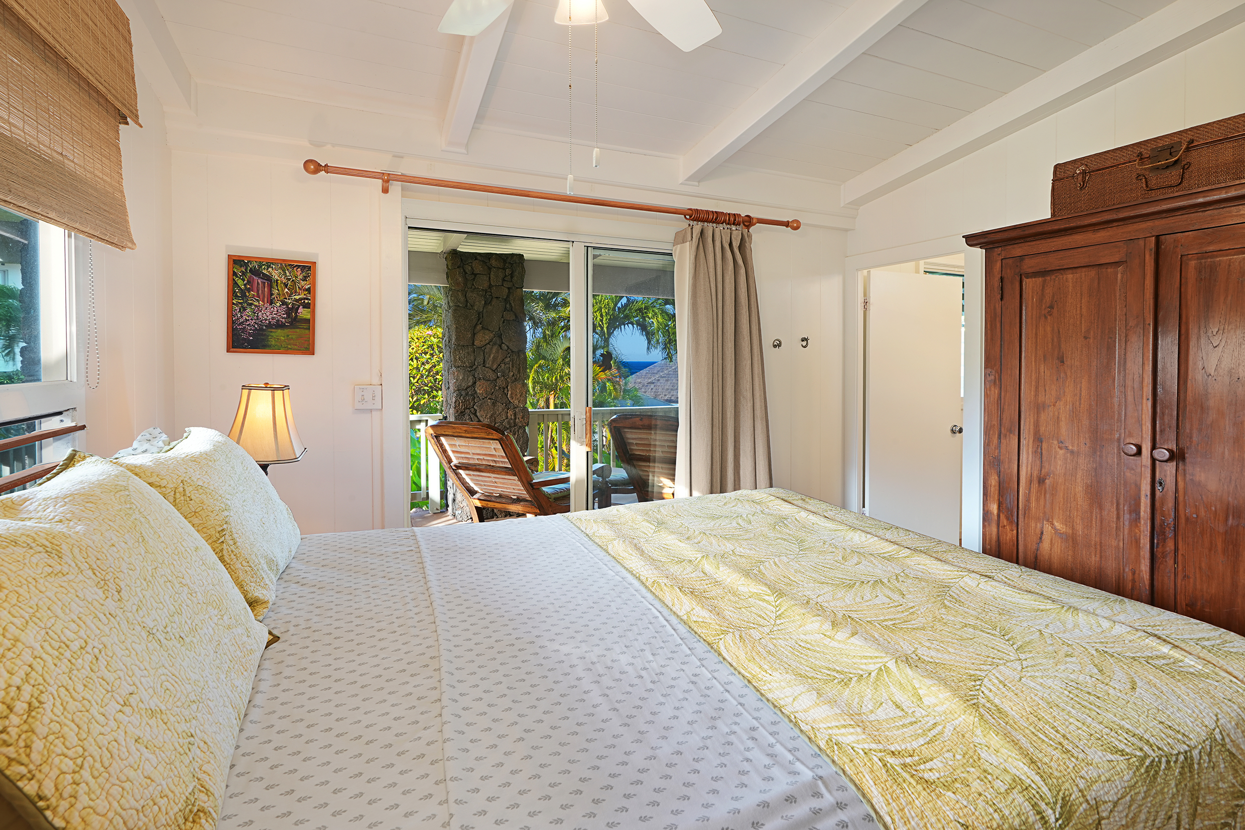 2261 Ho'ohu Road Koloa, HI 96756 - Photo 11 of 17 a bedroom with a bed and large windows