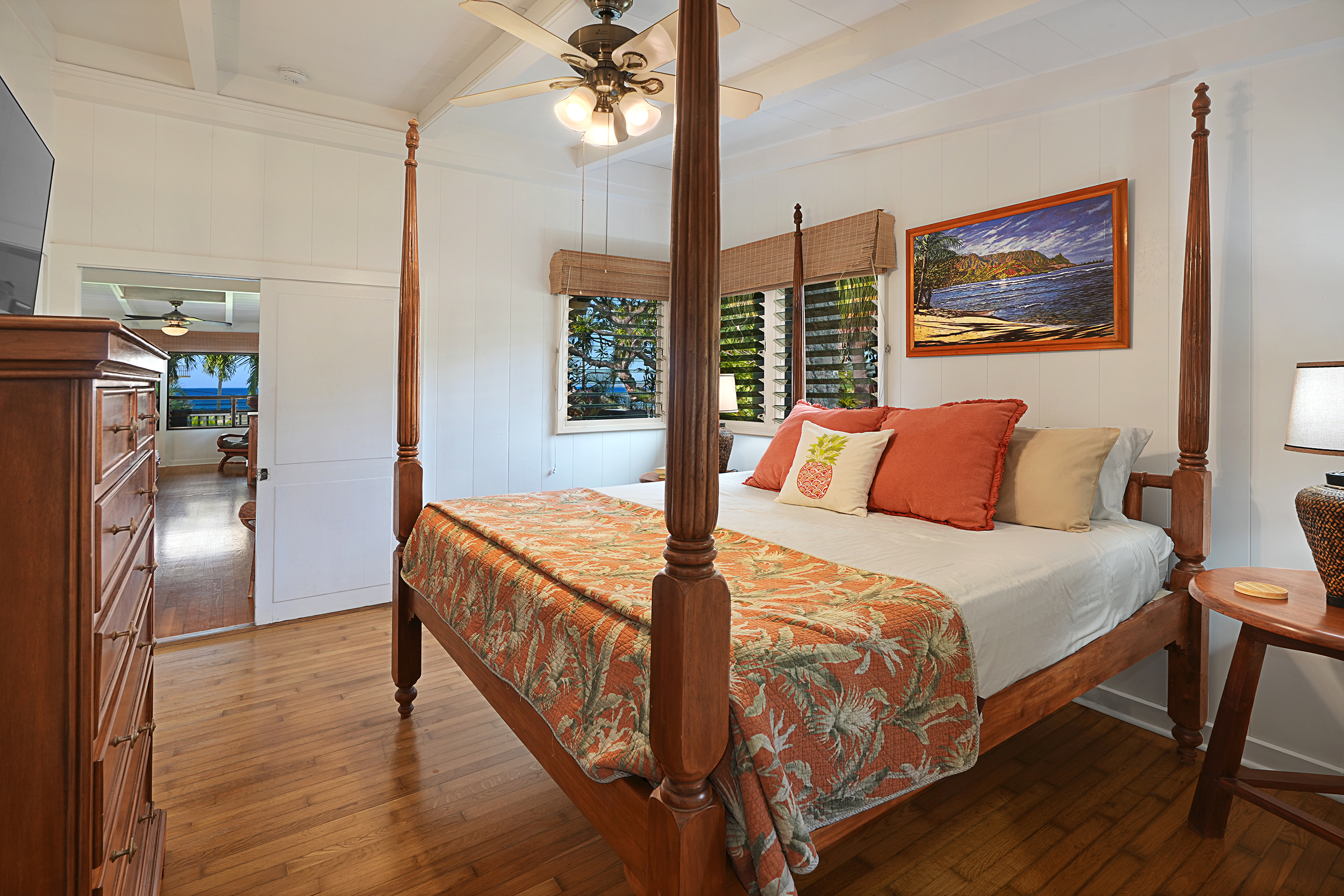2261 Ho'ohu Road Koloa, HI 96756 - Photo 14 of 17 a bedroom with a bed and a painting on the wall