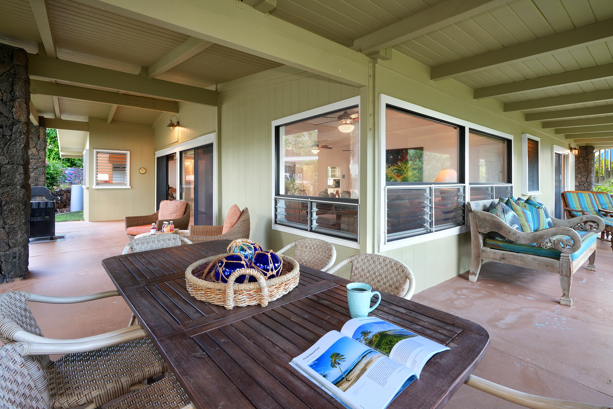 2261 Ho'ohu Road Koloa, HI 96756 - Photo 9 of 17 a living room with furniture and a table