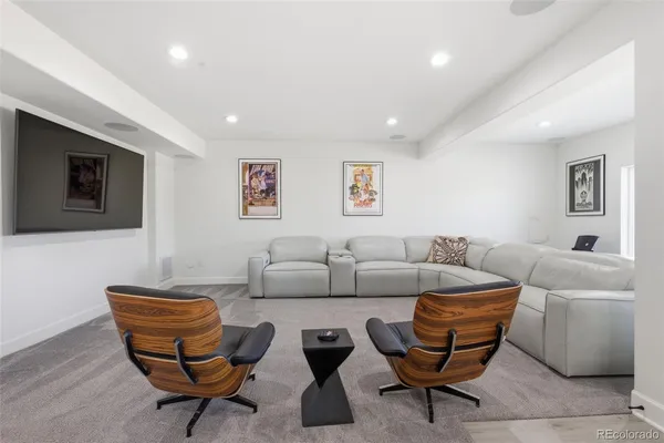 a living room with furniture and a table