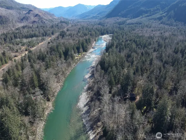 a view of a lake with mountains in front of it