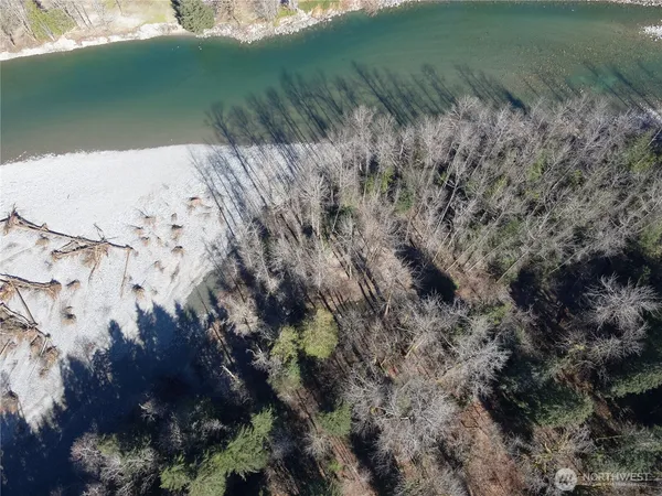 a view of a field with an ocean