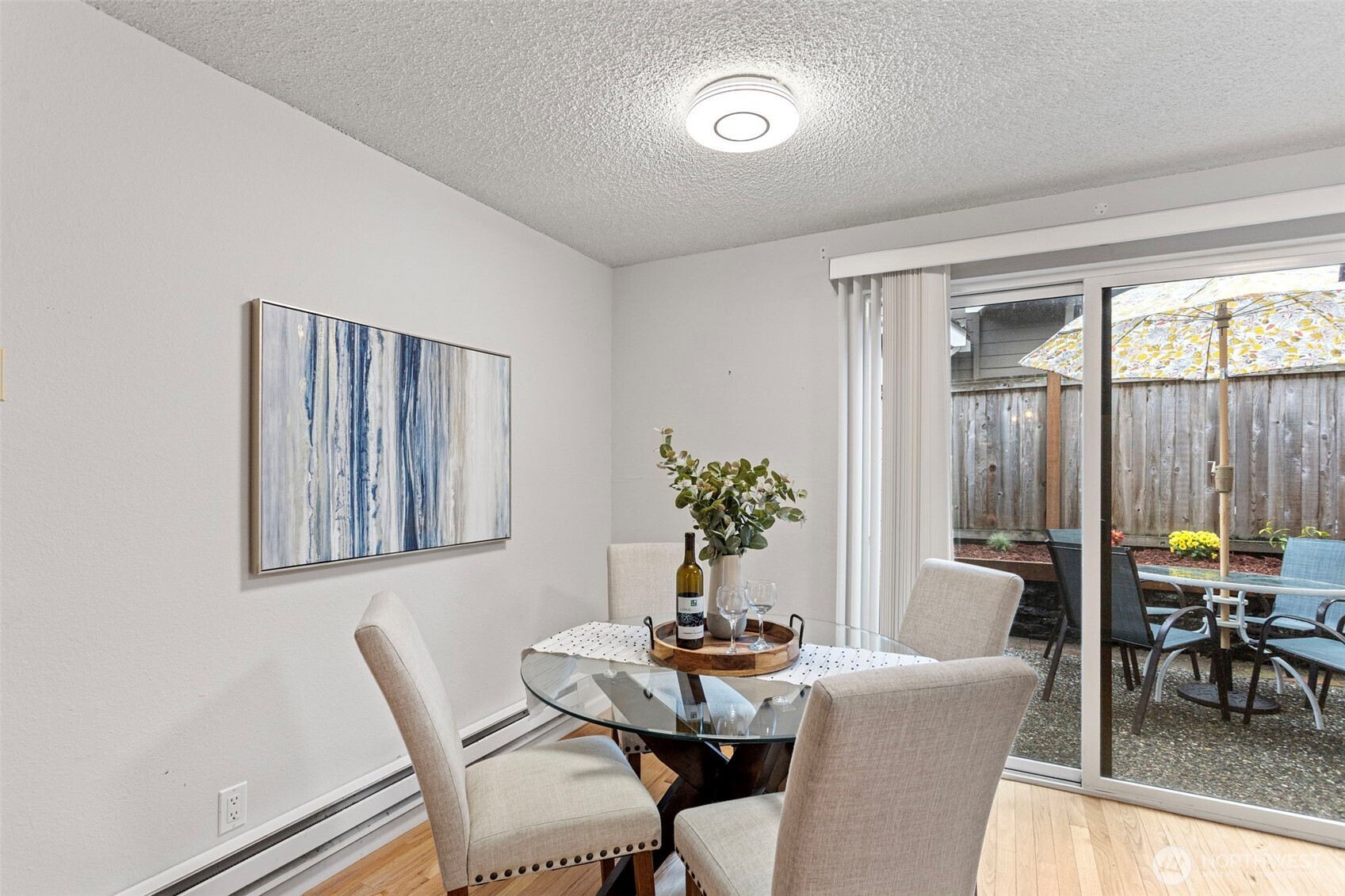 20714 76th Avenue West, Unit 11 Edmonds, WA 98026 - Photo 6 of 29 a dining room with furniture and window