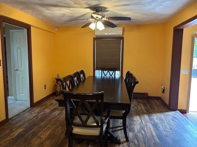 14 A Reed Street Londonderry, NH 03053 - Photo 11 of 39 a dining room with furniture and wooden floor