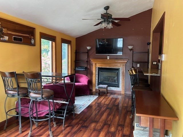 14 A Reed Street Londonderry, NH 03053 - Photo 12 of 39 a living room with furniture fireplace and flat screen tv