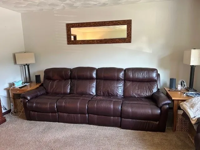 a living room with couches and furniture