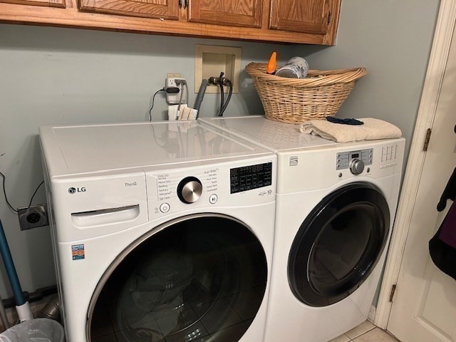 14 A Reed Street Londonderry, NH 03053 - Photo 17 of 39 a utility room with dryer and washer