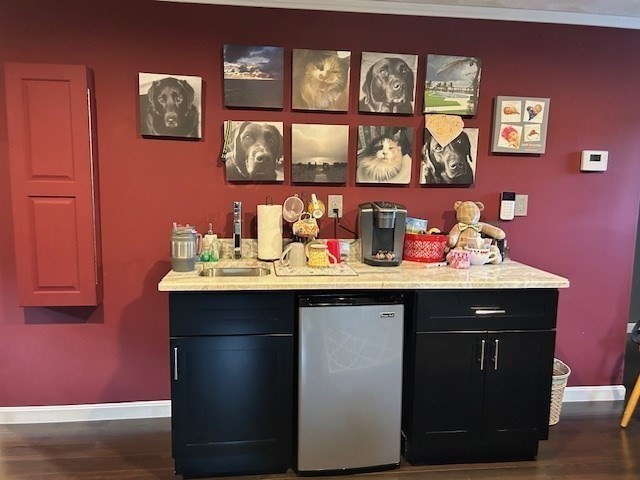14 A Reed Street Londonderry, NH 03053 - Photo 19 of 39 a room with painting and wooden floor