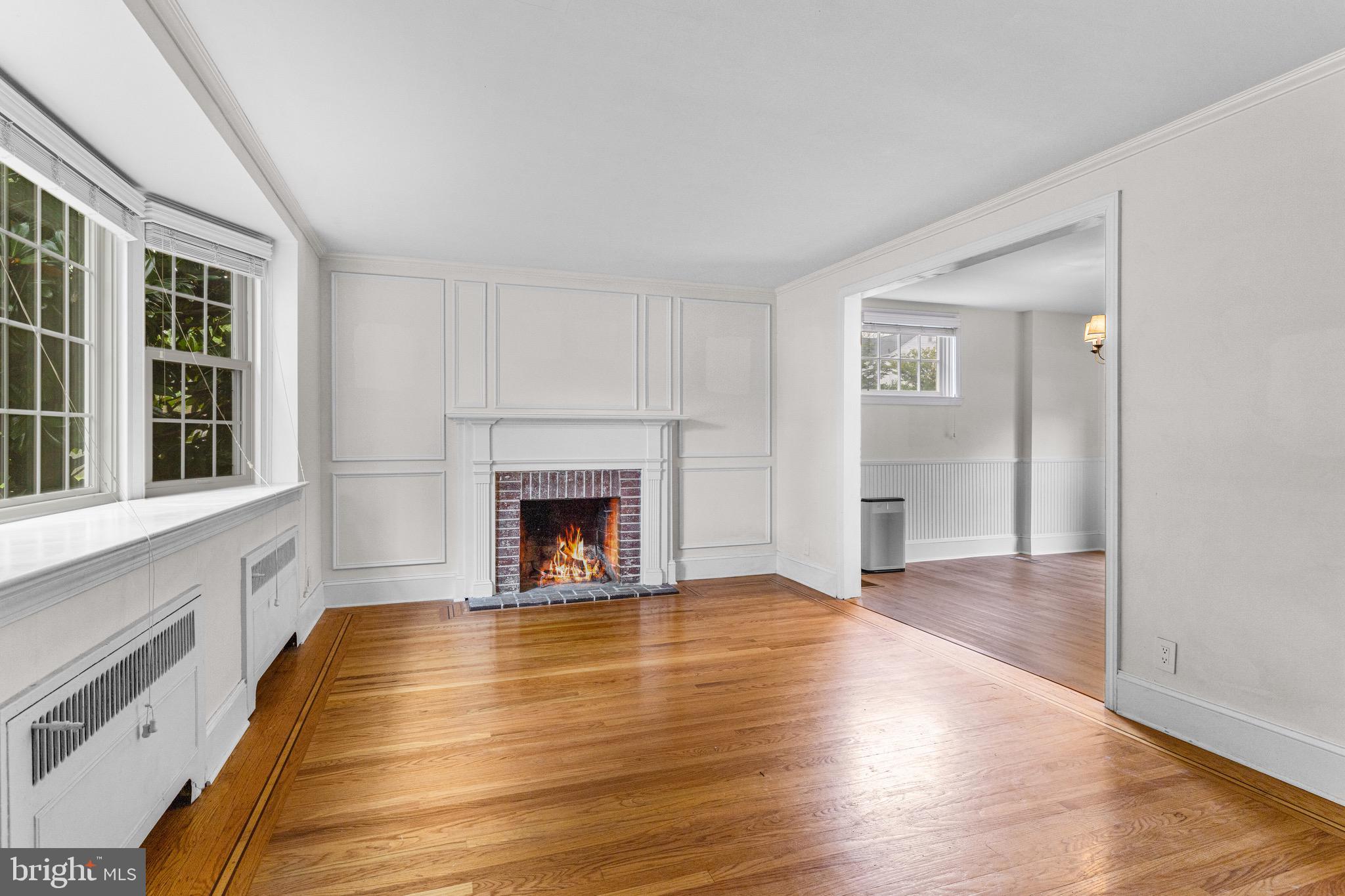 56 West Chelfield Road Glenside, PA 19038 - Photo 3 of 39 Living Room w/ bay window & wood burning fireplace