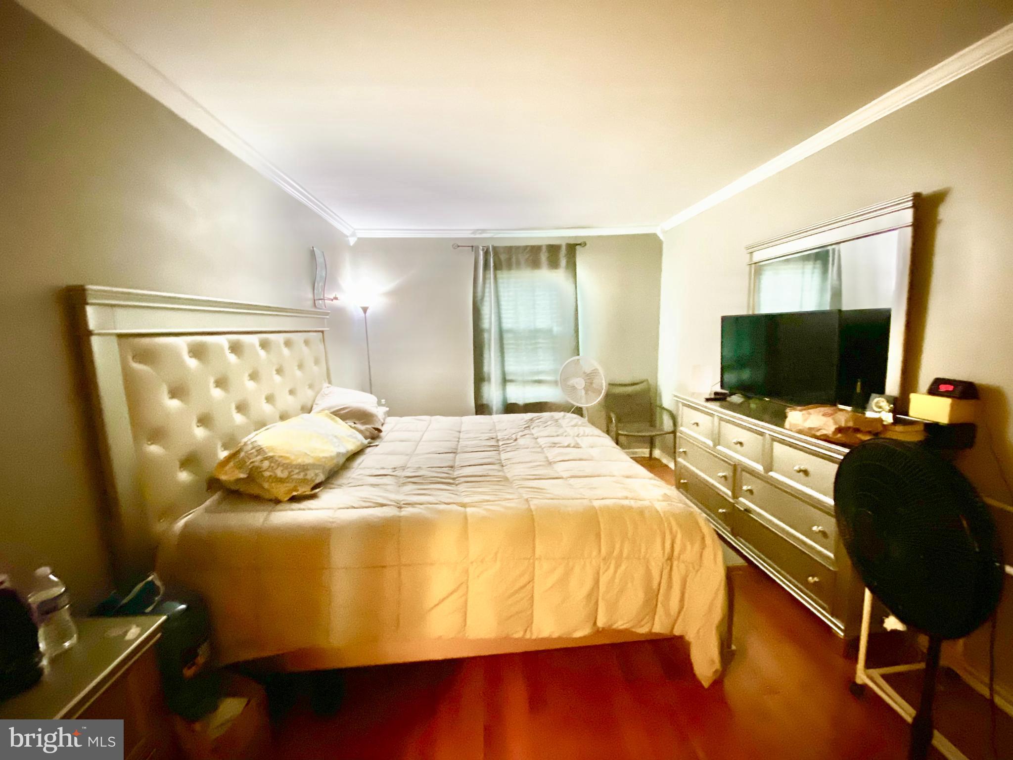 3341 Red Lion Road Philadelphia, PA 19114 - Photo 6 of 14 a bedroom with a bed and flat screen tv