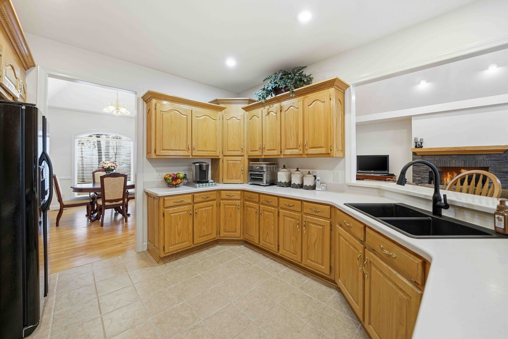 174 White Tail Ridge Road Jasper, GA 30143 - Photo 13 of 66 a kitchen with stainless steel appliances granite countertop a sink a stove counter space and cabinets