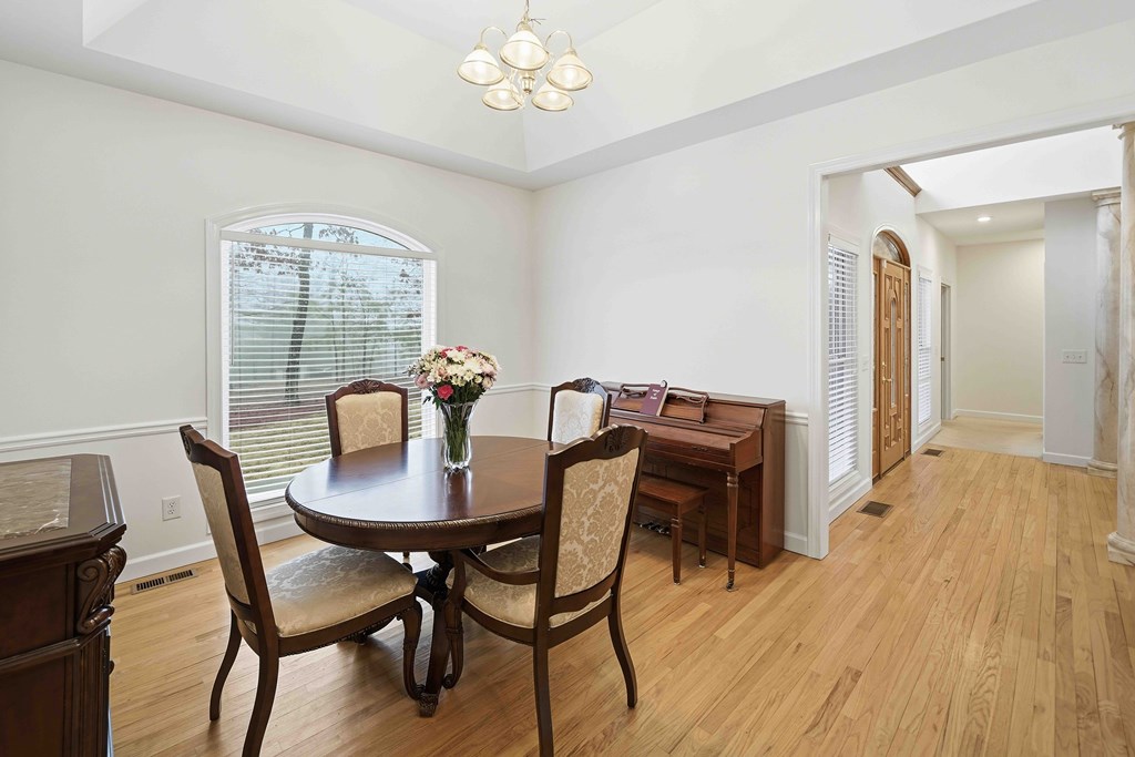 174 White Tail Ridge Road Jasper, GA 30143 - Photo 4 of 66 a view of a dining room with furniture and wooden floor