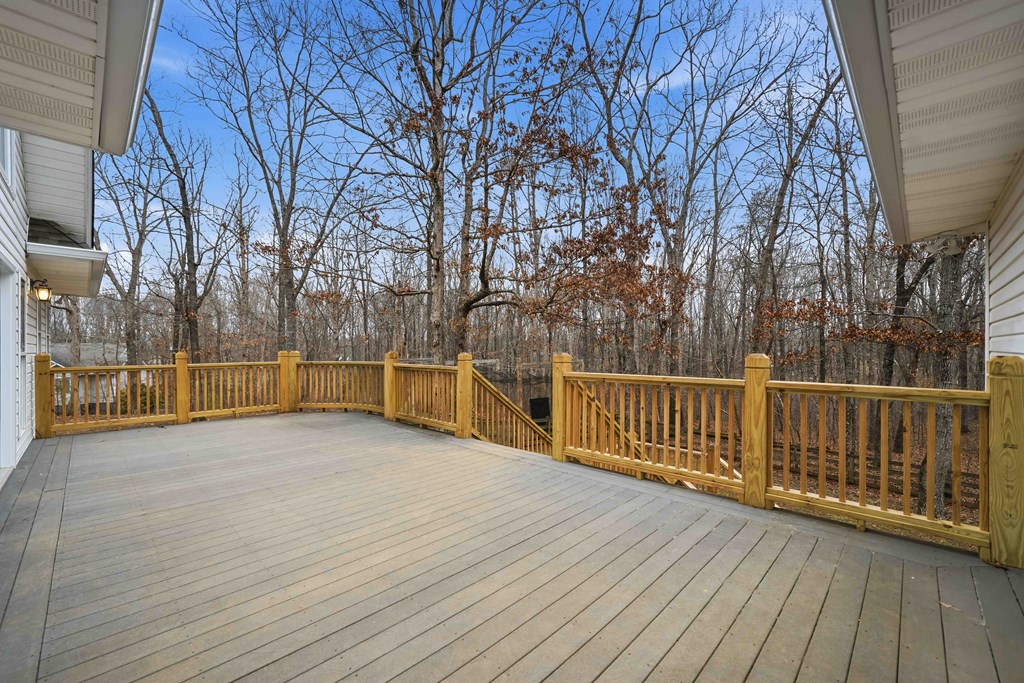 174 White Tail Ridge Road Jasper, GA 30143 - Photo 45 of 66 a view of backyard with deck and wooden floor