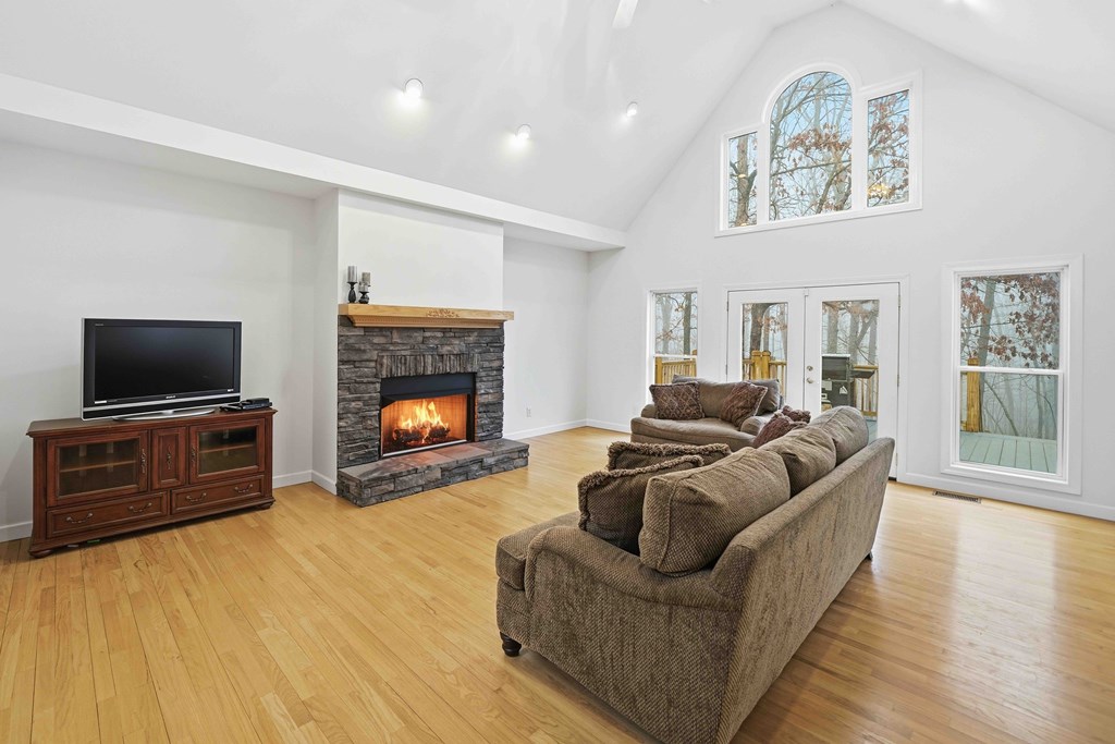 174 White Tail Ridge Road Jasper, GA 30143 - Photo 5 of 66 a living room with furniture and a flat screen tv