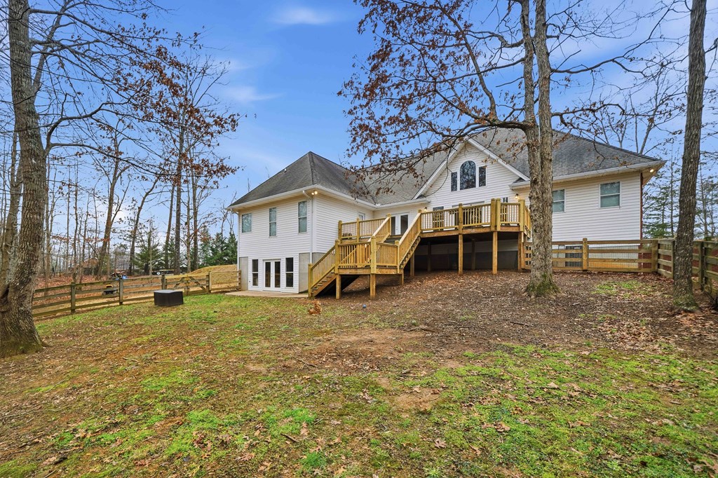 174 White Tail Ridge Road Jasper, GA 30143 - Photo 55 of 66 a view of a house with a big yard and large tree