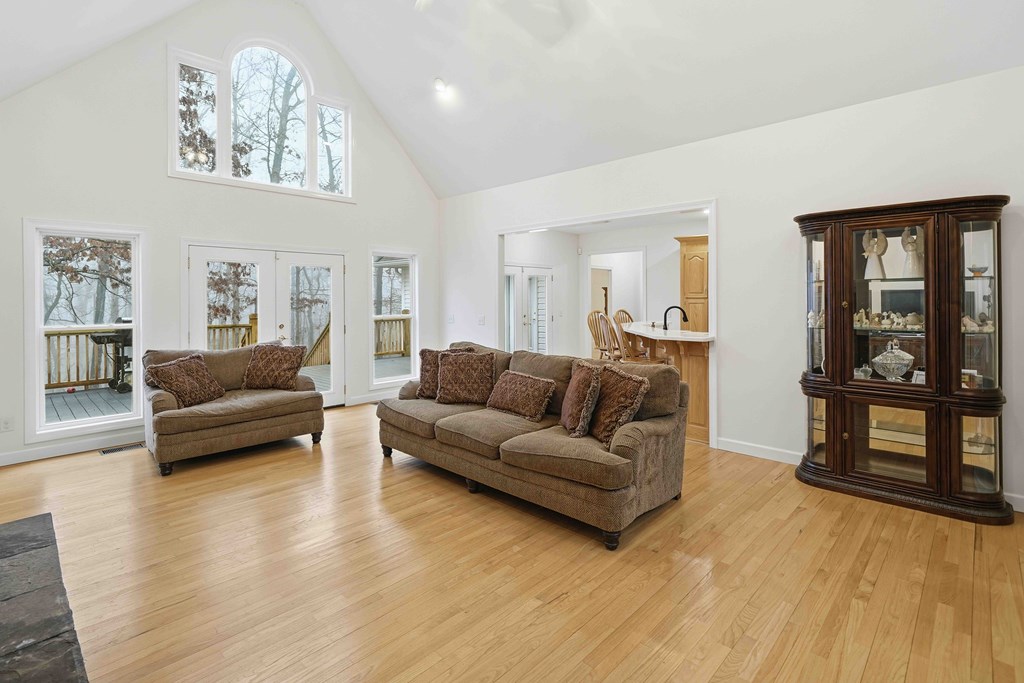 174 White Tail Ridge Road Jasper, GA 30143 - Photo 7 of 66 a living room with furniture and wooden floor