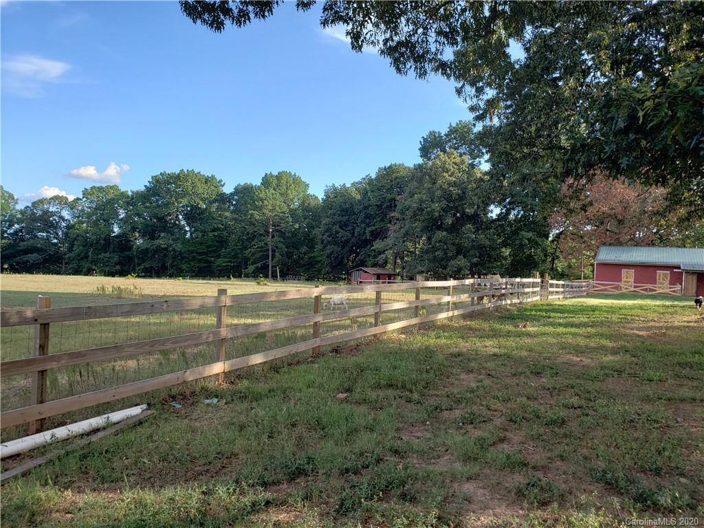 2415 Ruben Road Monroe, NC 28112 - Photo 12 of 42 a view of a field with an trees