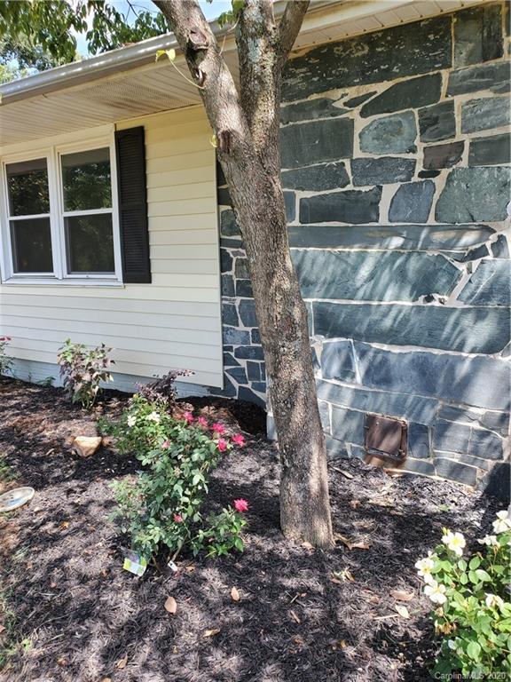 2415 Ruben Road Monroe, NC 28112 - Photo 15 of 42 a front view of a house with a yard