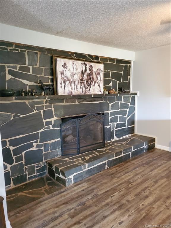 2415 Ruben Road Monroe, NC 28112 - Photo 28 of 42 a room with gym equipment and a large window