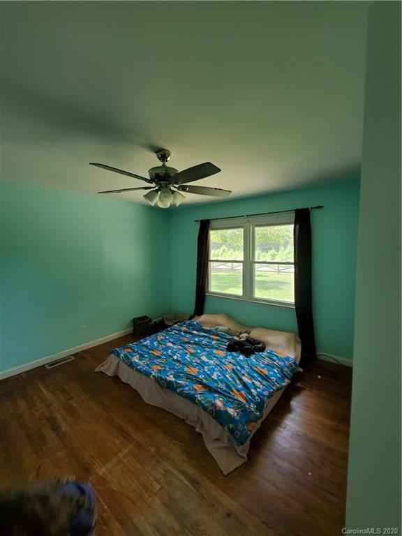 2415 Ruben Road Monroe, NC 28112 - Photo 31 of 42 a bedroom with a bed and window