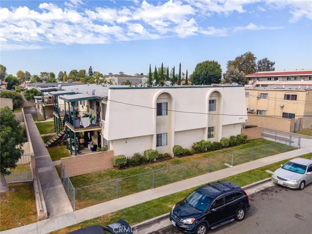 an aerial view of a house with outdoor space