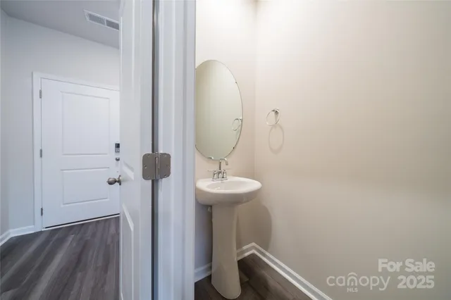 a bathroom with a sink and toilet