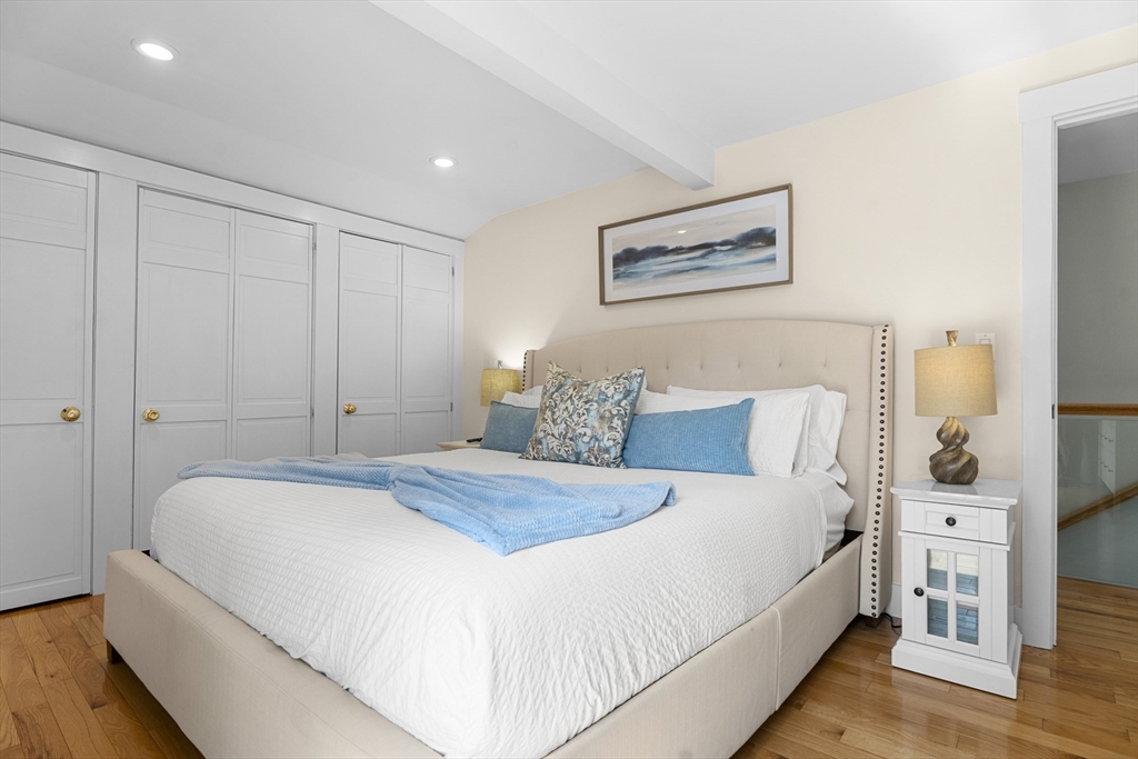 4 Hye Lane Edgartown, MA 02539 - Photo 12 of 41 a bedroom with a bed and a night stand