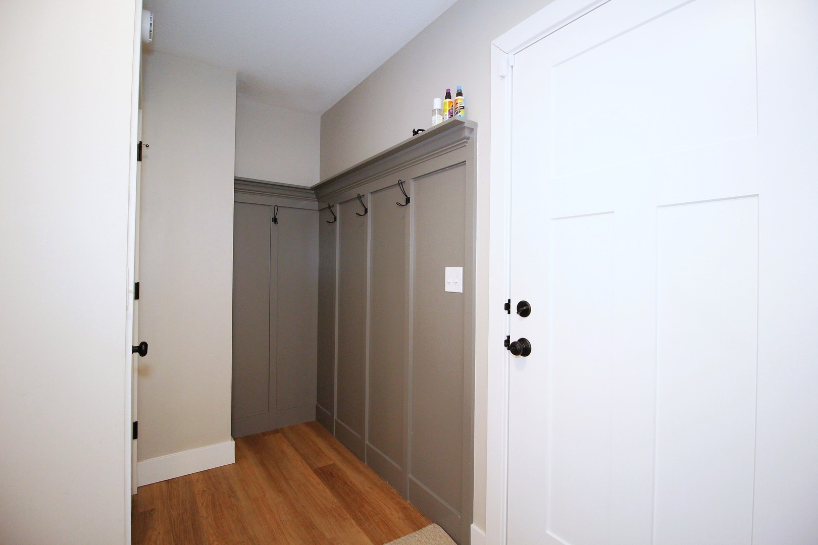 425 Jenny Lane, Unit B Heyworth, IL 61745 - Photo 12 of 25 a view of a hallway with wooden floor