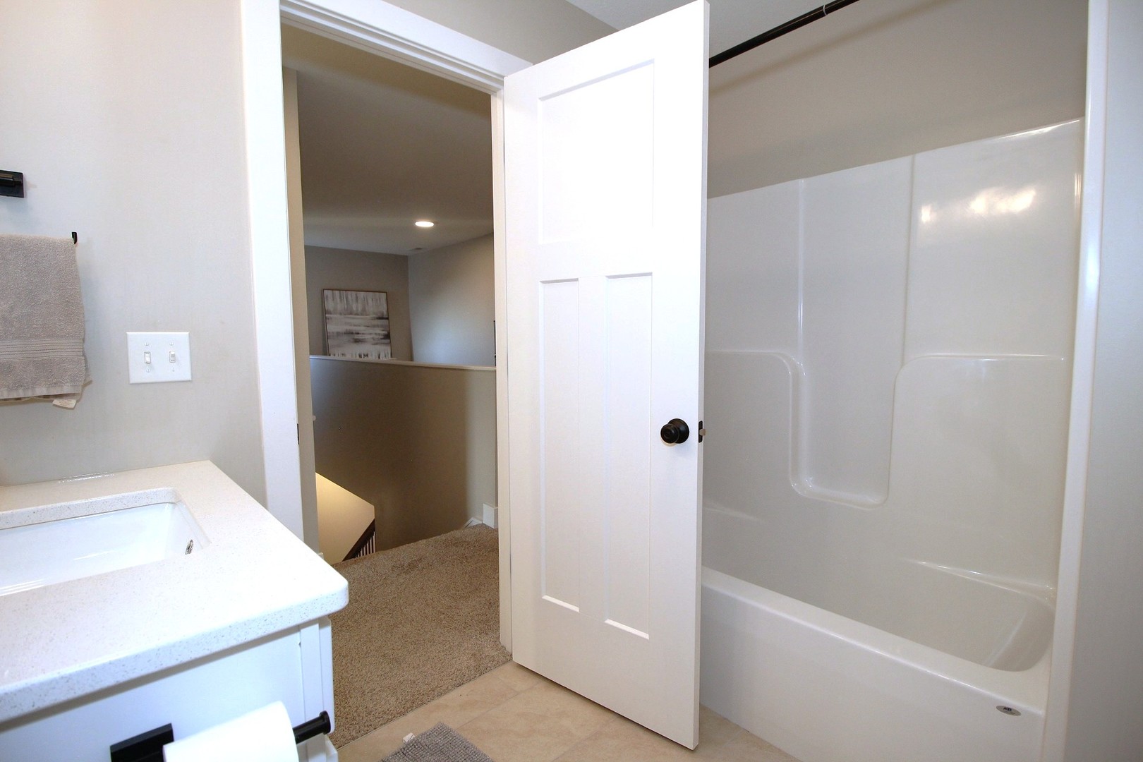 425 Jenny Lane, Unit B Heyworth, IL 61745 - Photo 20 of 25 a bathroom with a bathtub and a sink