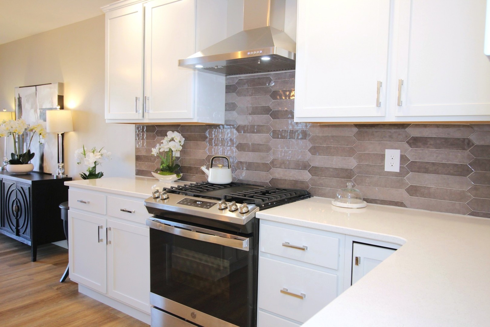 425 Jenny Lane, Unit B Heyworth, IL 61745 - Photo 3 of 25 a kitchen with white cabinets and appliances