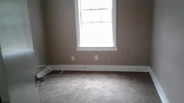 an empty room with a window