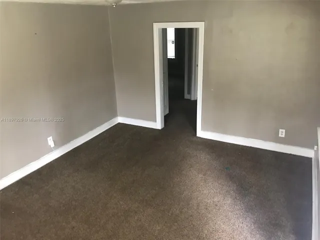 an empty room with closet