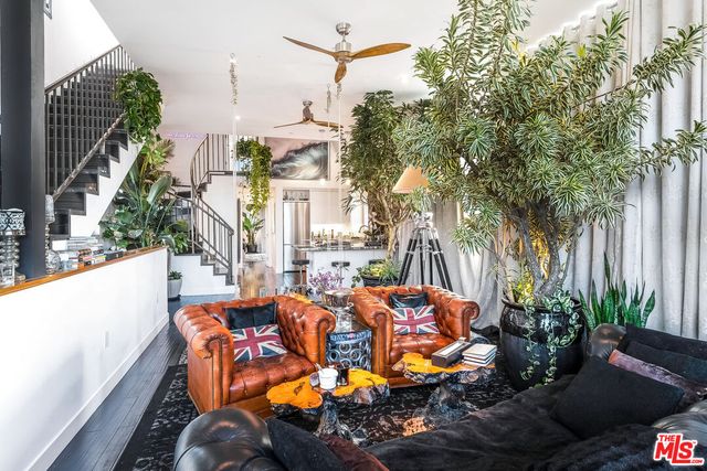 a view of a balcony with plants