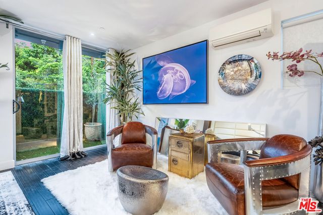 a work place with furniture and a window