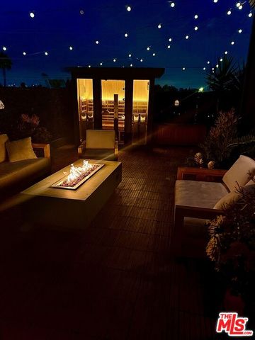 a view of a lobby with furniture and floor to ceiling window