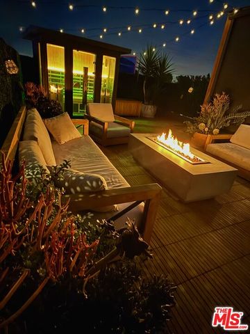 a view of swimming pool with outdoor seating