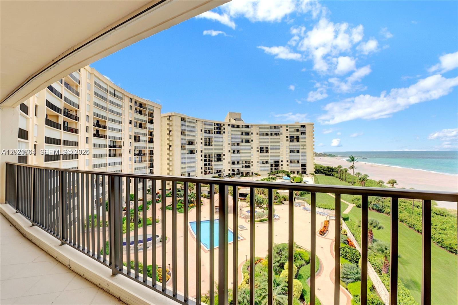 300 Ocean Trail Way, Unit 702 Jupiter, FL 33477 - Photo 23 of 31 a view of a building from a balcony