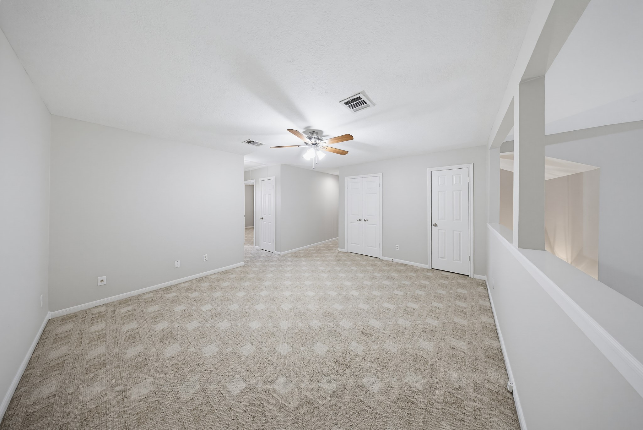 727 Bunker Hill Road, Unit 34 Houston, TX 77024 - Photo 25 of 38 The game room has two storage closets and has a few of the chimney and living area below.