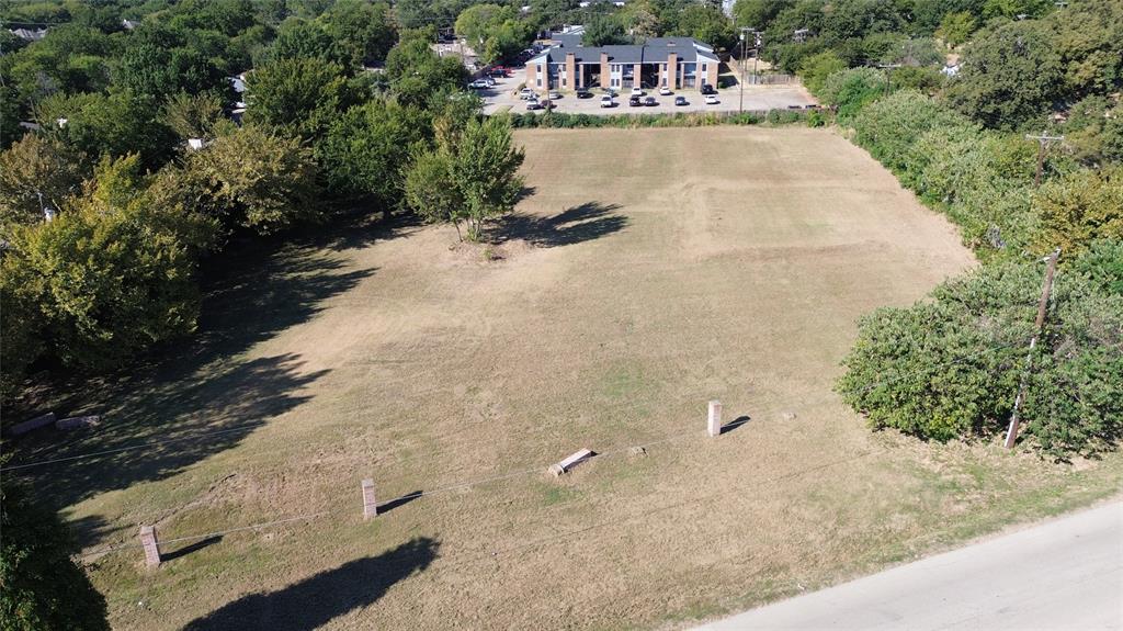 801 Singleton Boulevard Irving, TX 75060 - Photo 12 of 12 a view of swimming pool with a yard and lake view