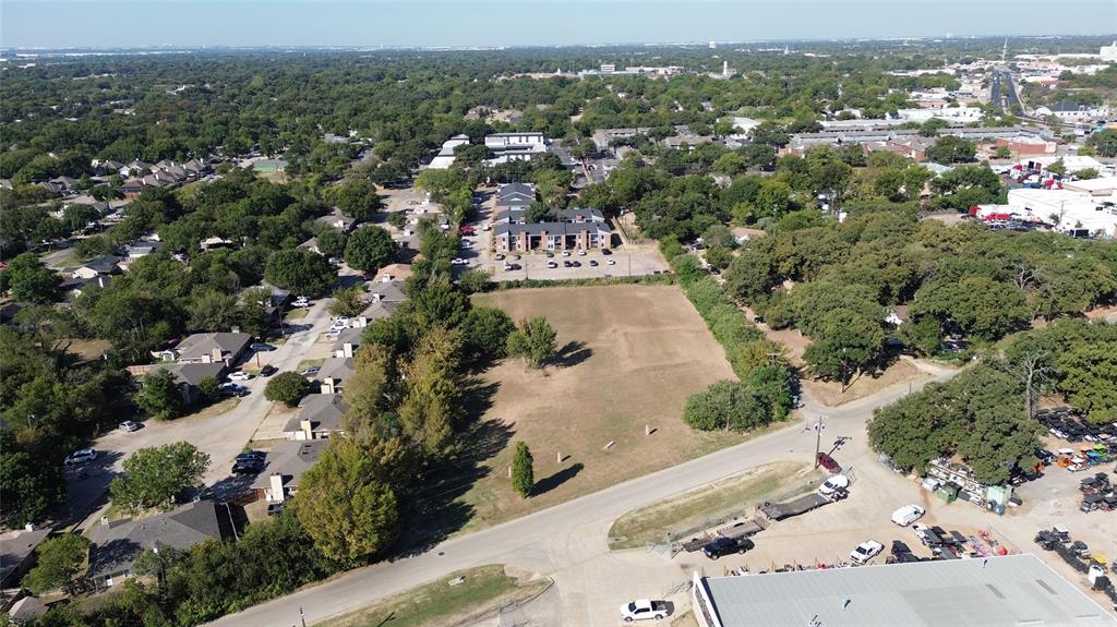 801 Singleton Boulevard Irving, TX 75060 - Photo 3 of 12 an aerial view of residential houses with outdoor space