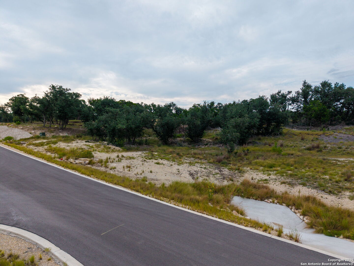 593 Rosemary Rdg Drive Bulverde, TX 78163 - Photo 14 of 18 a view of a swimming pool with a yard