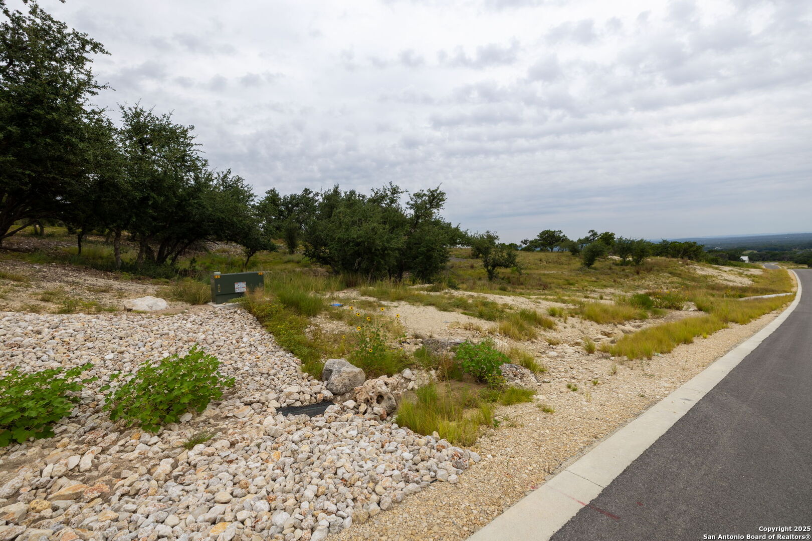 593 Rosemary Rdg Drive Bulverde, TX 78163 - Photo 18 of 18 a view of a yard with wooden fence