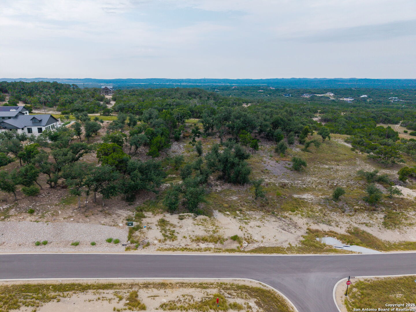 593 Rosemary Rdg Drive Bulverde, TX 78163 - Photo 2 of 18 a view of a yard with wooden fence